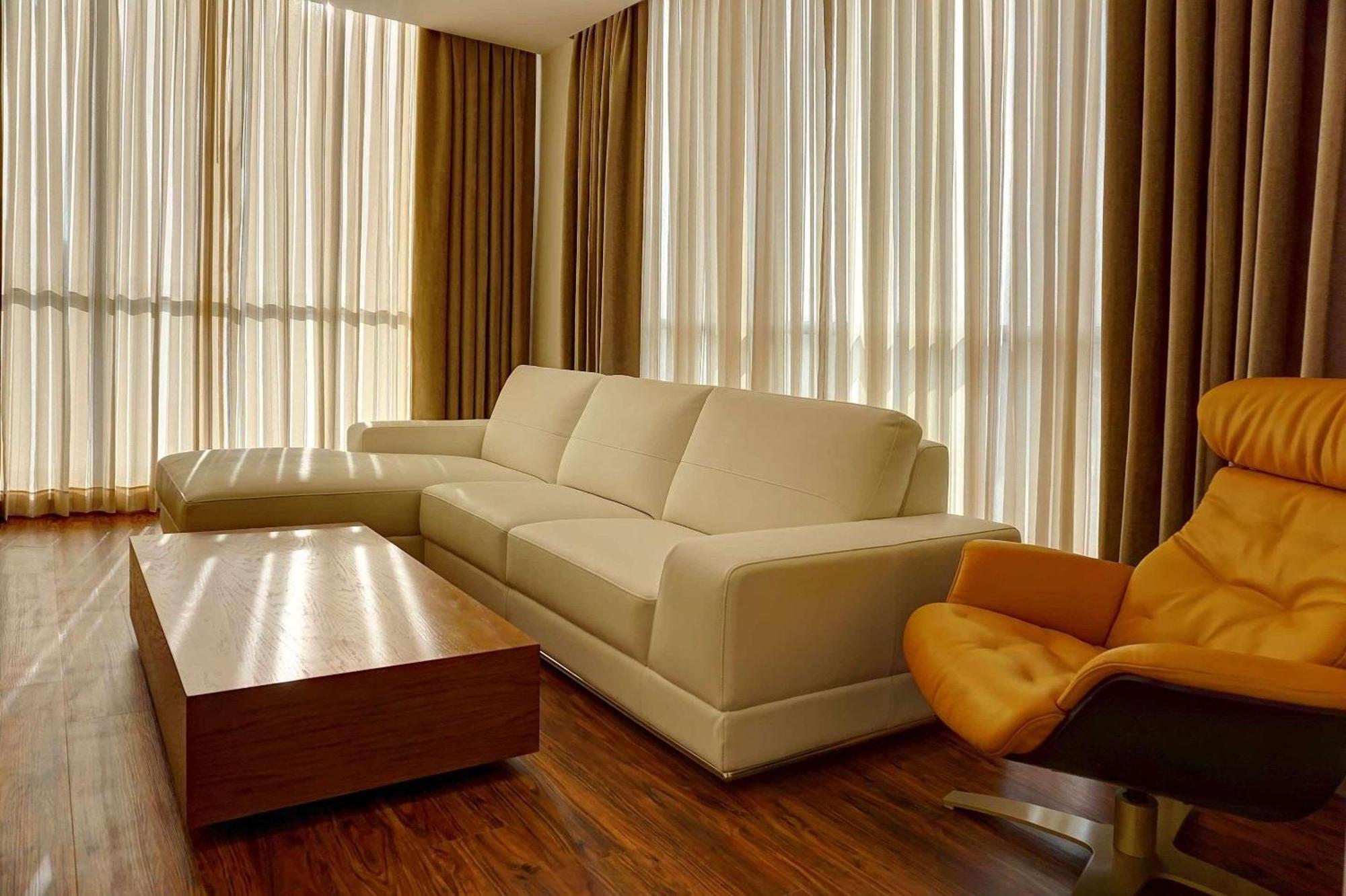Radisson Hotel Guayaquil Exterior photo A living room with a sofa
